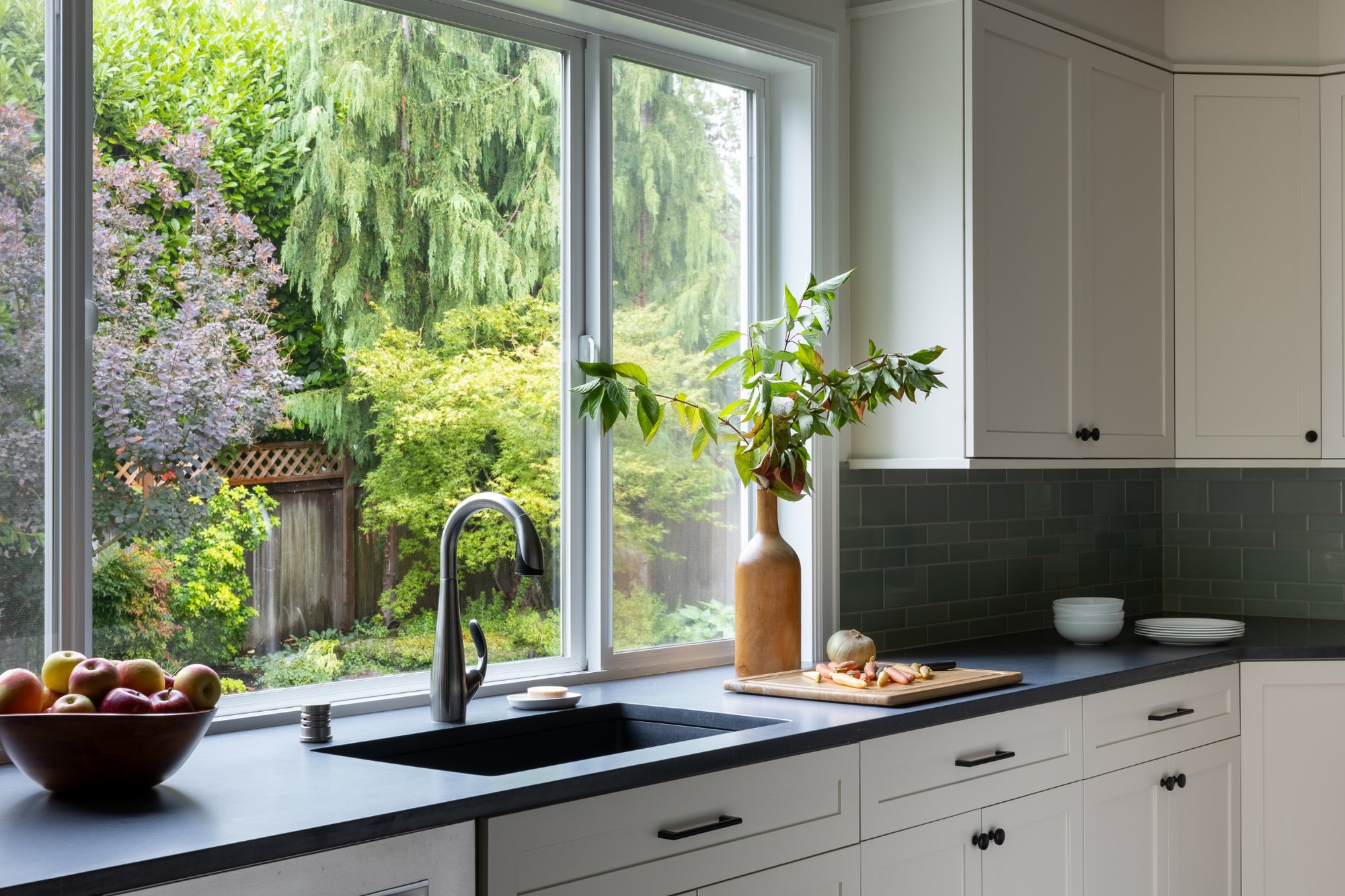 Whole House Remodel kitchen window overlooking backyard