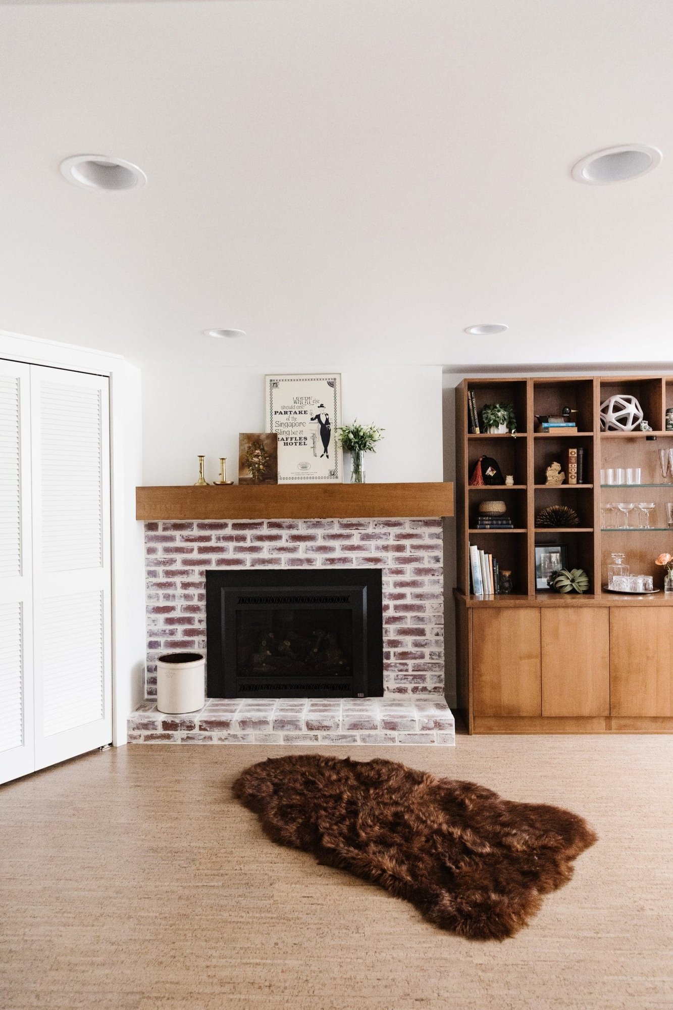 basement remodel in seattle with brick fireplace