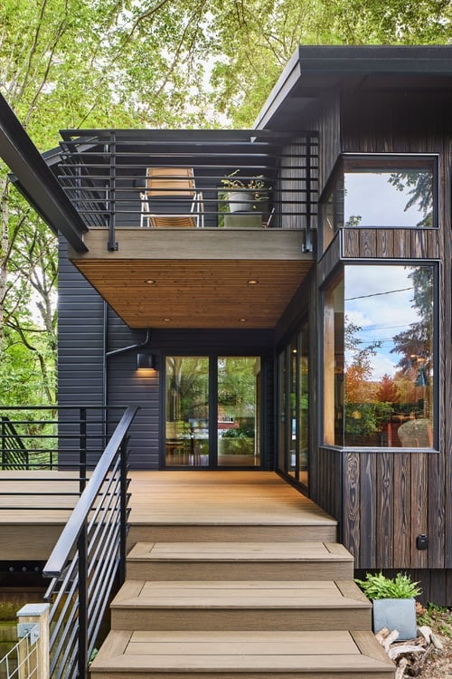 Treetop Retreat remodel with multi-level decking and black metal railings by Pathway Design & Construction in Seattle, WA.-optimized